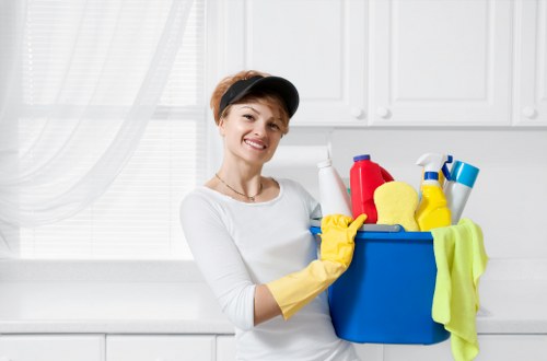 Staff member using protective gear during carpet cleaning